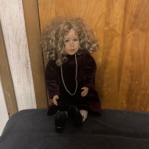 Elegant Doll with Burgundy Dress and Blonde Hair